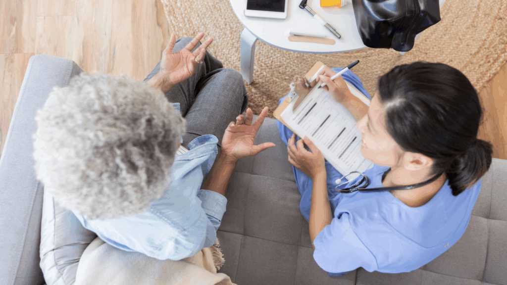 Doctor practicing patient-centered care by focusing on conversation and context