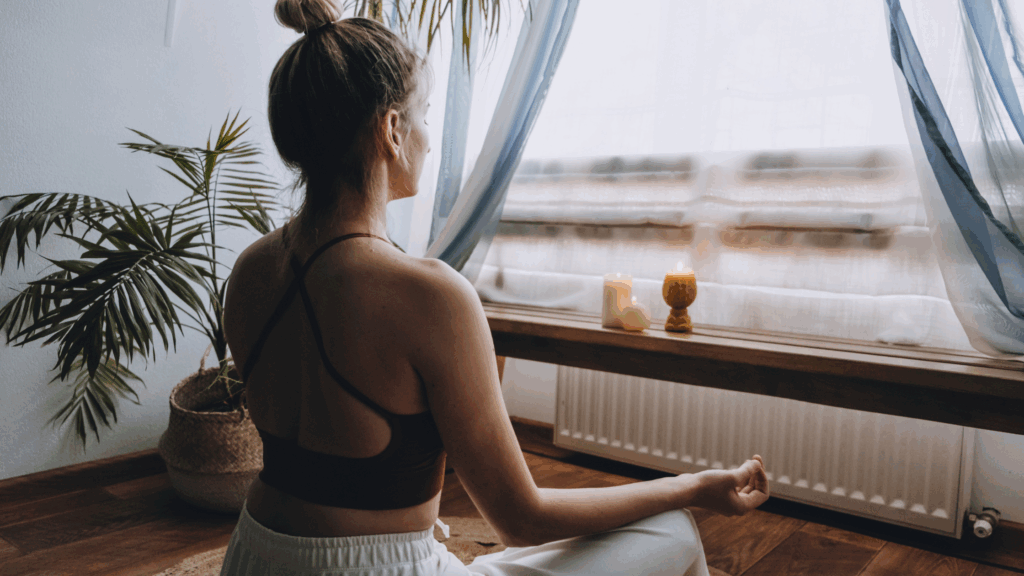 Woman practicing nervous system regulation through mindful breathwork

